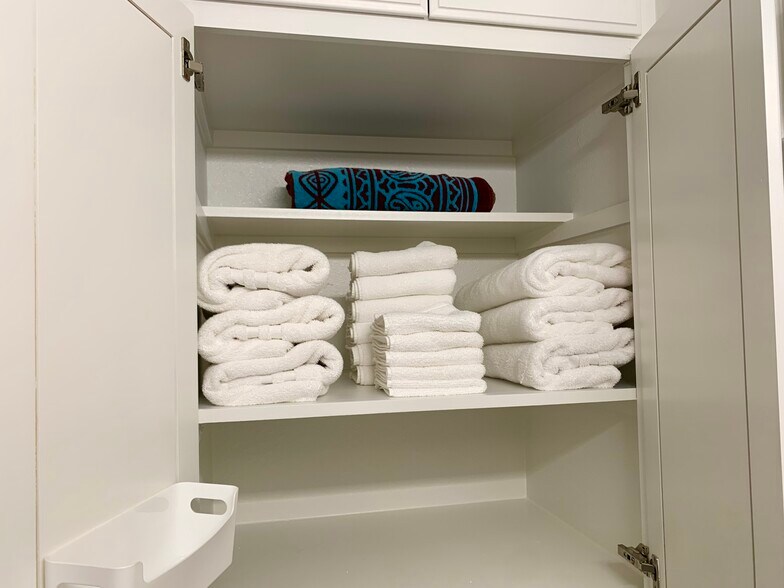 Bathroom linen closet. Austin, Texas 78751 - 407 E 45th St #116