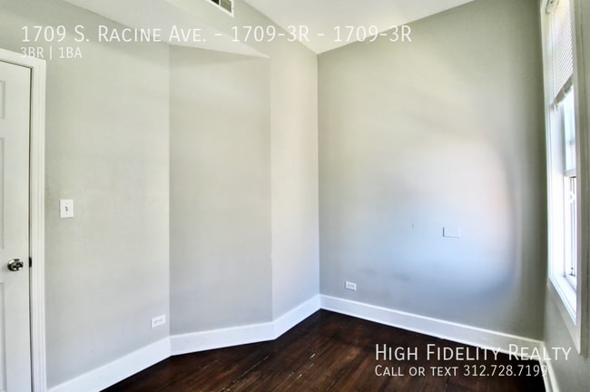 Building Photo - 1709 S Racine Ave