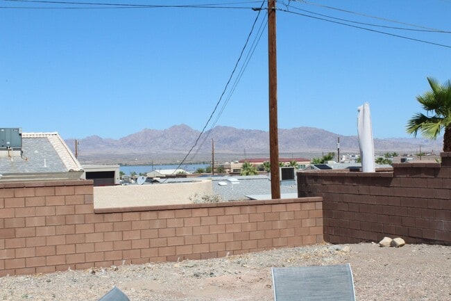 Building Photo - Long Term Rental! Available Unfurnished OR...