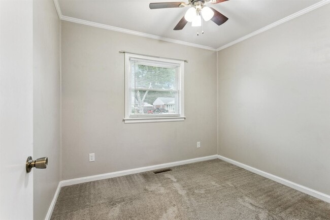 Building Photo - Charming brick rancher with modern kitchen...
