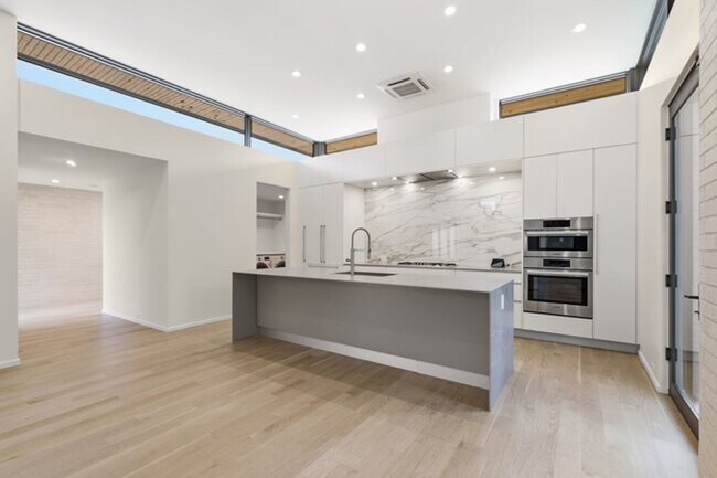 Building Photo - Experience contemporary luxury in this exceptional custom-built Midtown Tulsa residence, where so...
