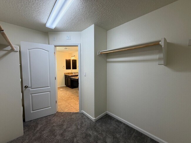 Building Photo - 4 Bedroom + Office Home Available Near Loma Colorado Blvd NE & Broadmoor Blvd NE in Rio Rancho!