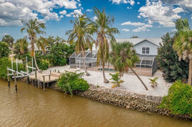 Building Photo - **Direct Gulf Access Pool Home! 4 BED/3 BA...