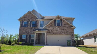 Building Photo - "Spacious 4-Bedroom Retreat with Modern Gr...