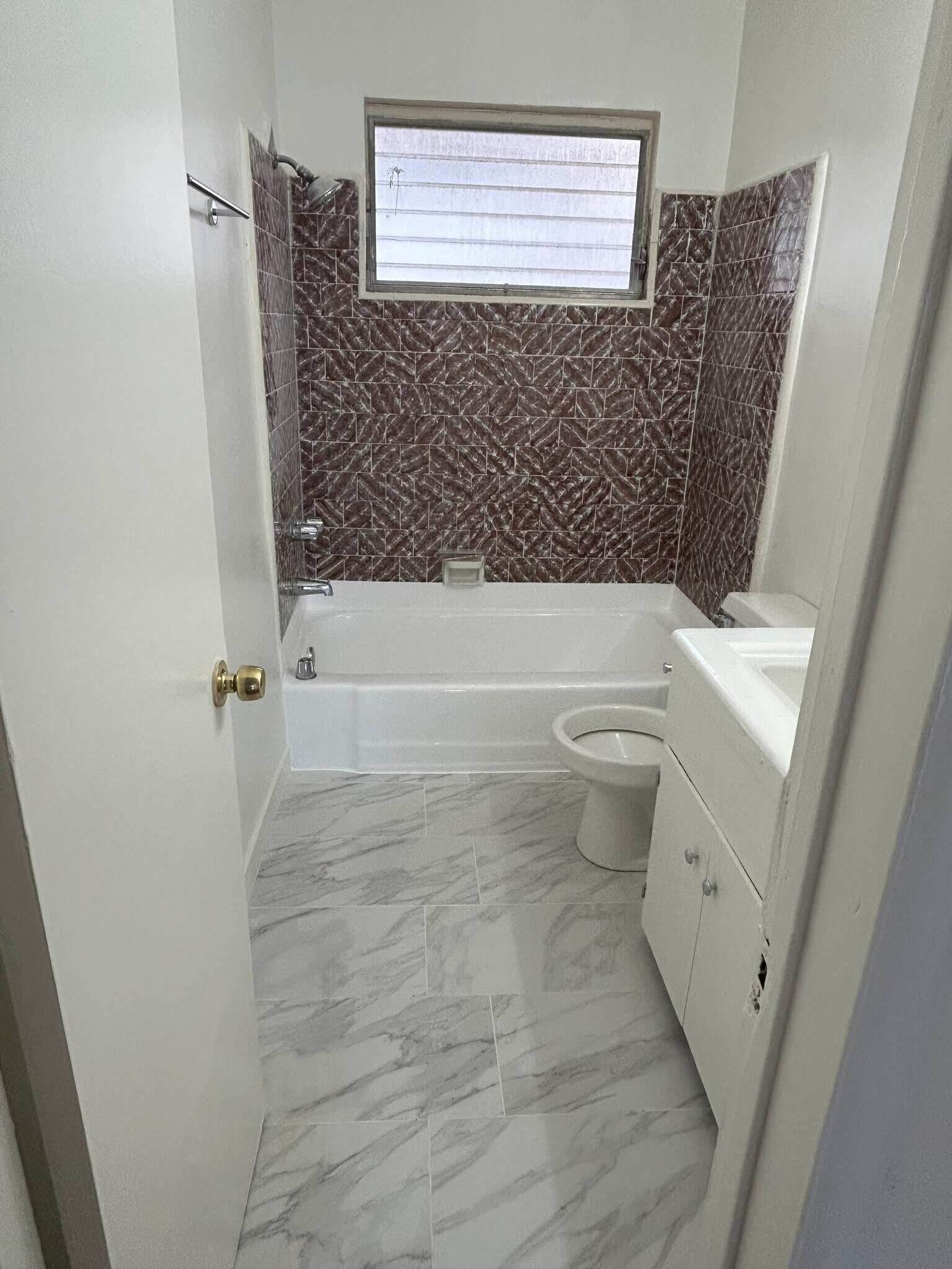 New Bathroom Floor - 7704 Romaine St