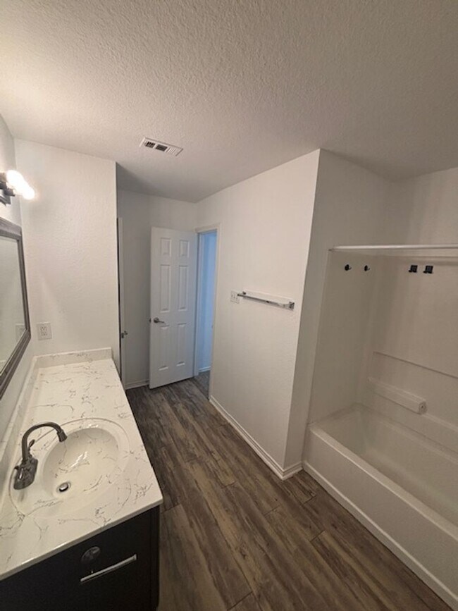 Building Photo - Move-In Ready 4-Bedroom Home with New Floo...