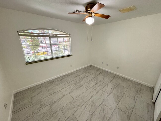 Building Photo - This inviting single-story home boasts a s...
