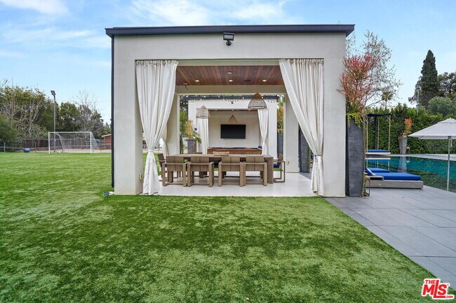 Building Photo - 6029 Melvin Ave