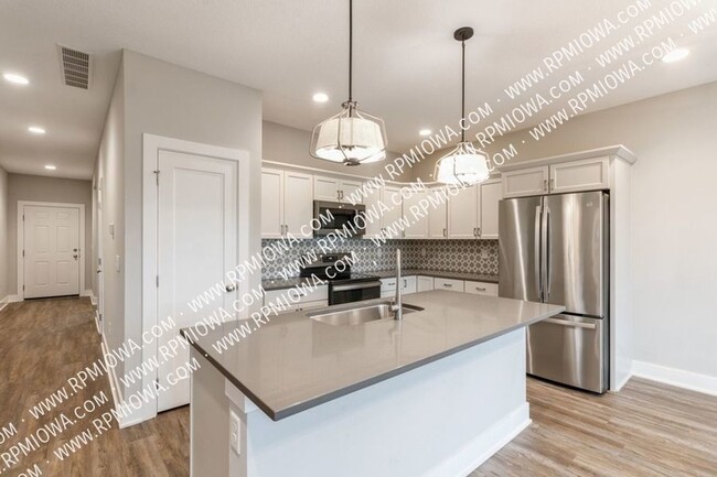 Building Photo - PRAIRIE TRAIL!! 4 Bed, 3 bath Home in Ankeny