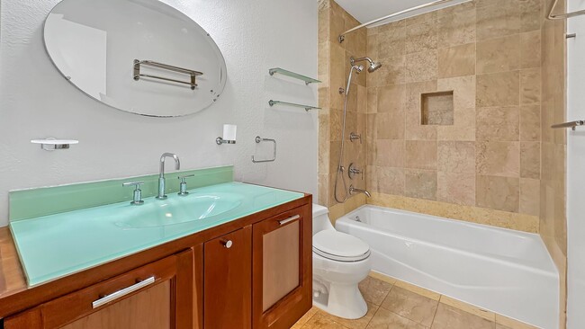 Building Photo - Waterfront Top-Floor West-Facing Apartment...