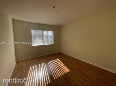 Building Photo - 2 br, 2 bath Condo - 6851 SW 44th St Apt 309