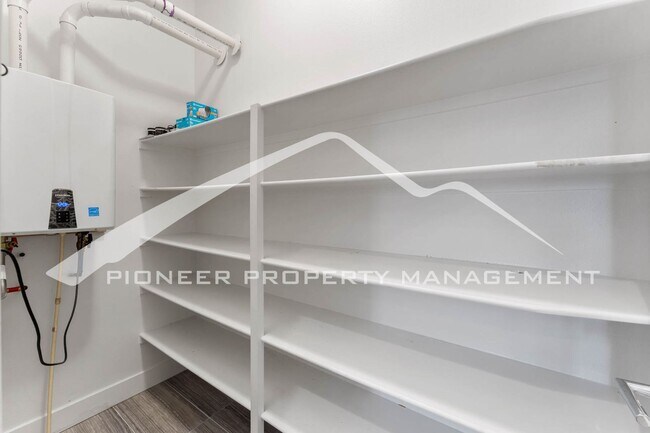 Building Photo - Fantastic Townhome with A Roof Top Patio, Attached Garage, and Central AC!