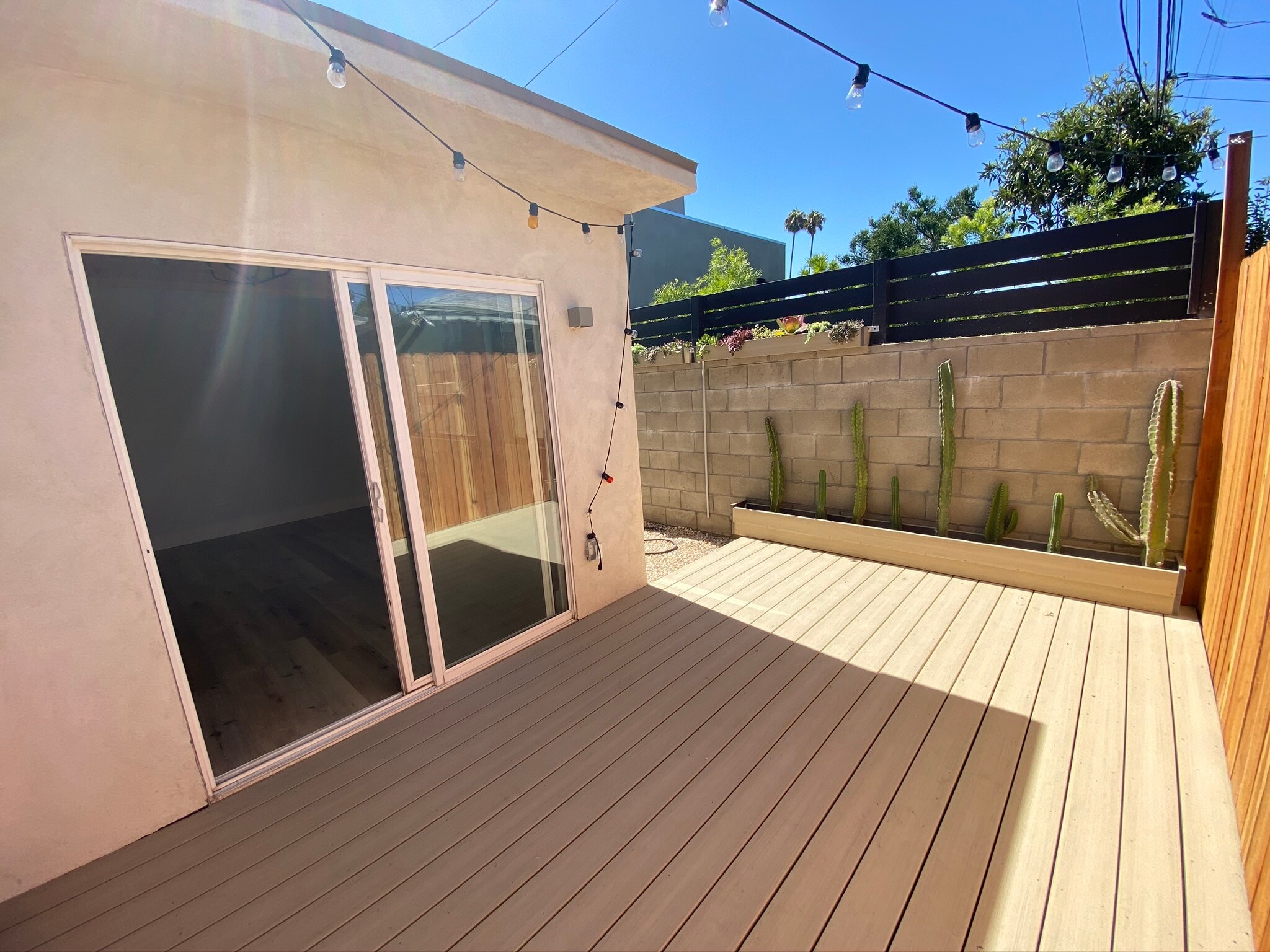 Patio wraps around the house - 3605 Helms Ave