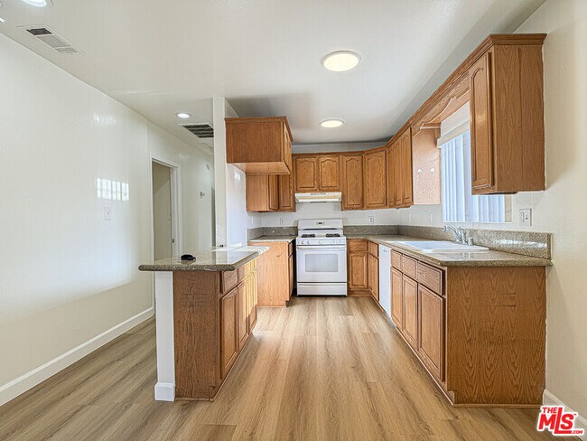 Building Photo - 1555 W 204th St