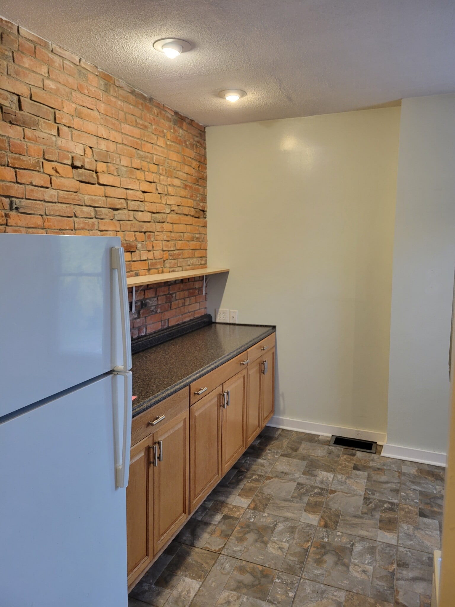Exposed Brick Tile Floors - 629 Oak St