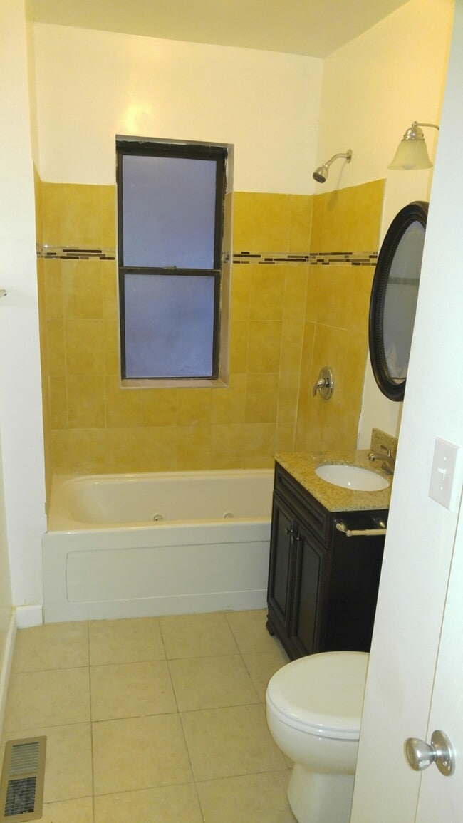 Building Photo - 4747 S Langley Ave