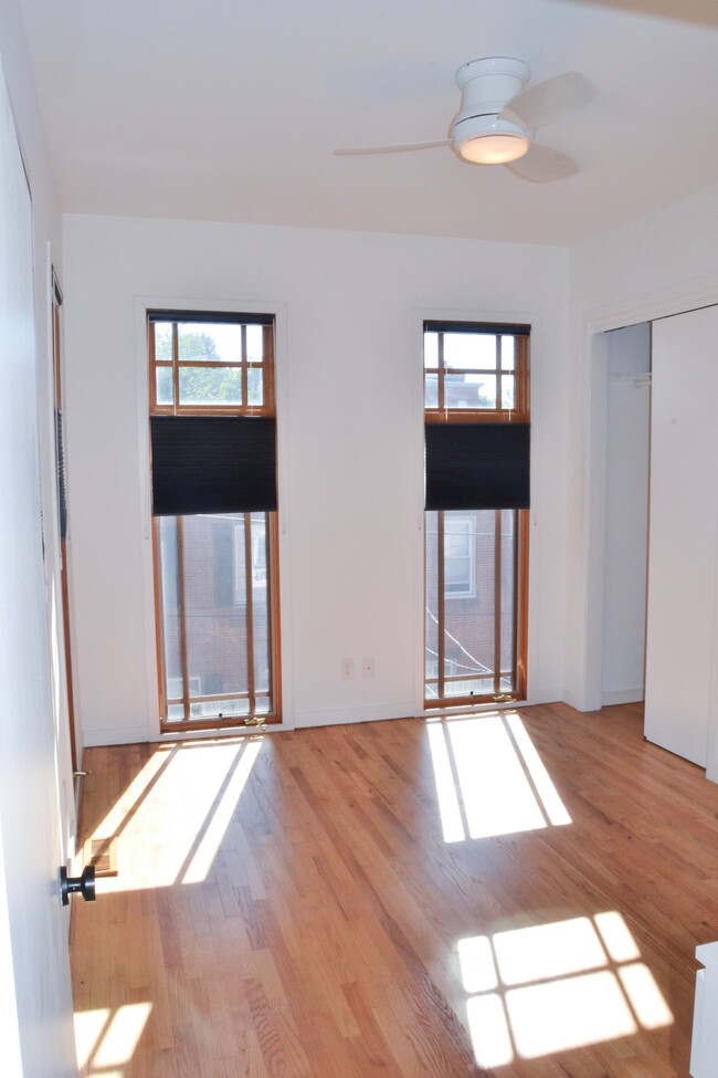 Third floor bedroom with custom 8 foot windows and blackout shades - 816 N Pennock St