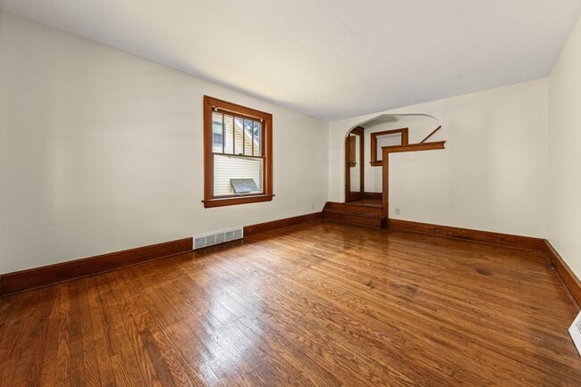 Building Photo - Classic Goodyear Heights Colonial — Hardwood, Arched Dining, Garage + Big Basement