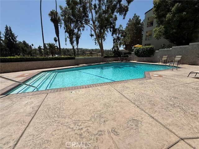 Building Photo - 5555 Canyon Crest Dr