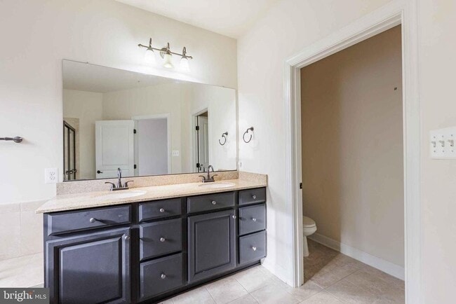 Building Photo - 9733 Braidwood Ter