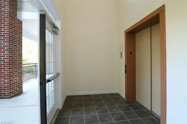 Building Photo - Inviting, modern two bedroom with garage parking, balcony views and a wonderful location in Chape...