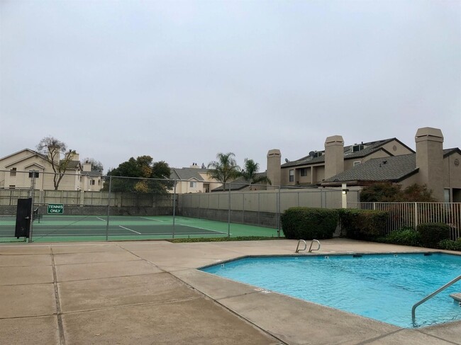 Building Photo - Upscale condo located in gated Community!