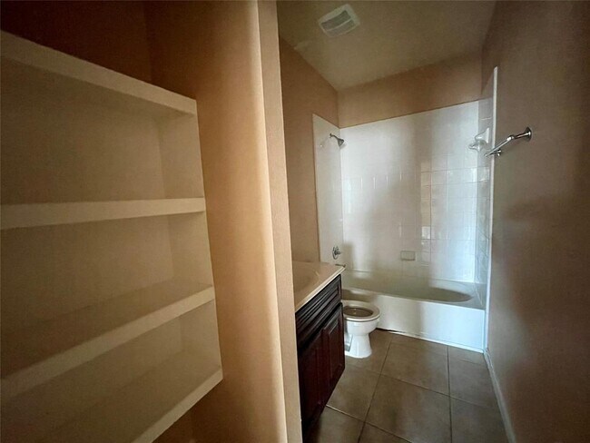 Building Photo - 10803 Woodwind Shadows Dr