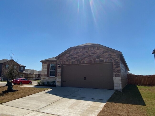 Building Photo - The newly built 4 bedroom and 2 bath home ...