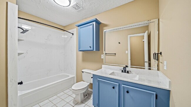 Building Photo - Enjoy comfortable, low-maintenance living in this updated, pet-friendly, carpet-free 3-bedroom ho...