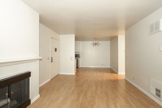 Building Photo - Peaceful Forest-View Condo with Fireplace & Private Balcony in Golden Oaks