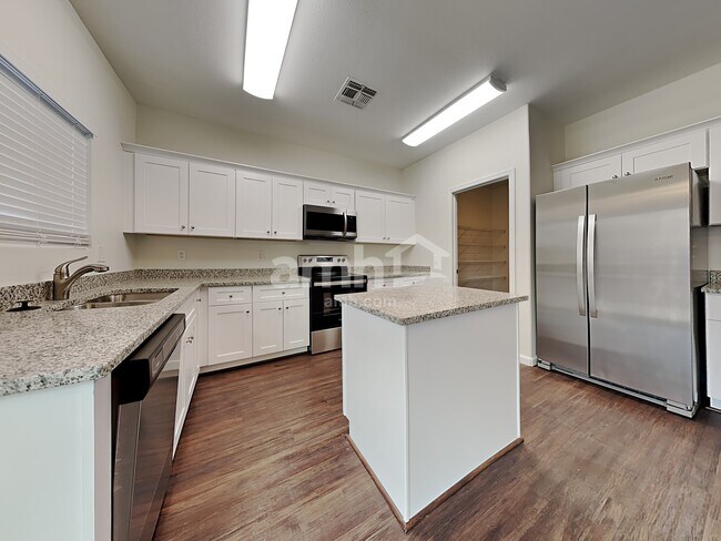 Building Photo - 1212 E Desert Rose Trail