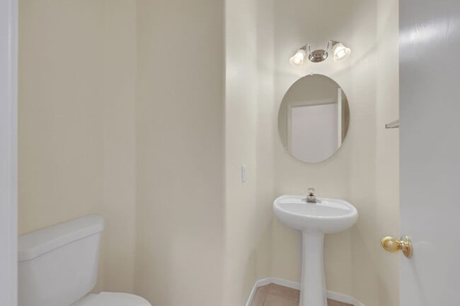 Building Photo - This beautifully updated 2-bedroom home is nestled in a gated community