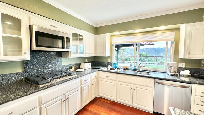 Building Photo - Spacious Two-Story Home with Three-Car Att...