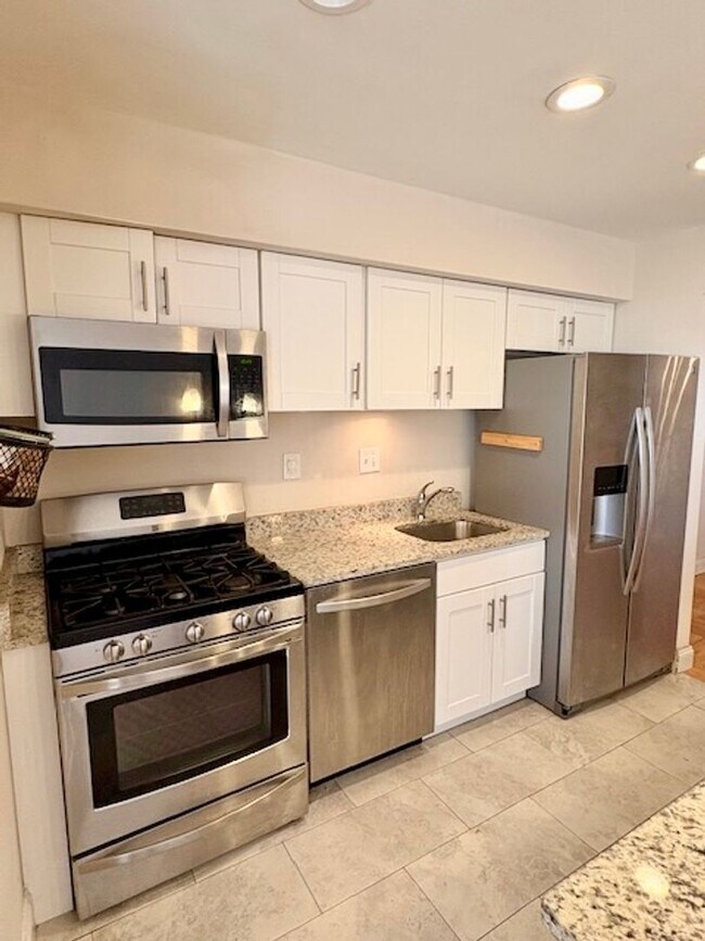 Building Photo - Remodeled 2 BR 1BA in Bethesda. Private front patio. Most utilities included.