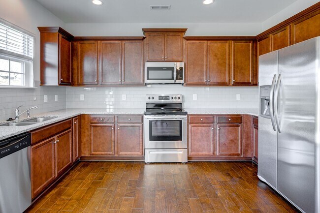 Building Photo - 4 Bedroom Rental in Mackintosh On The Lake Neighborhood!