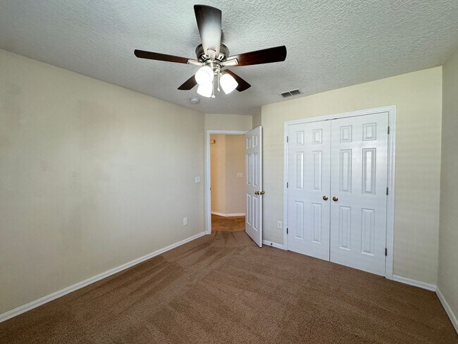 Building Photo - Spacious 4-Bedroom Home with Private Pool and Modern Comforts