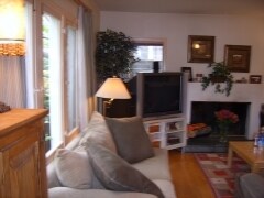 5. LVRM from entry door- triple front windows - 680 Highland St