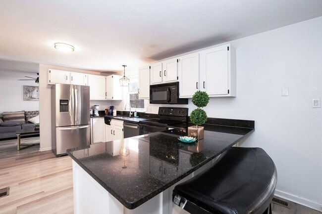 Building Photo - Four bedroom Corner Lot!