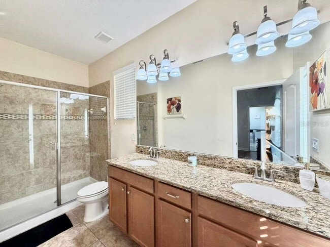 Building Photo - 8894 Candy Palm Rd