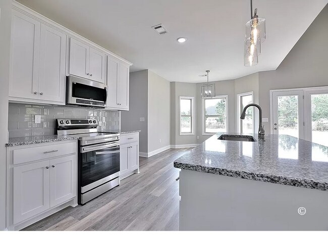 Building Photo - Coming soon - July Move In Date