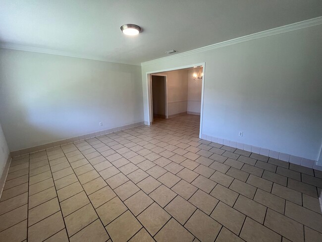 Building Photo - Charming 4-Bedroom Brick Home on Spacious ...