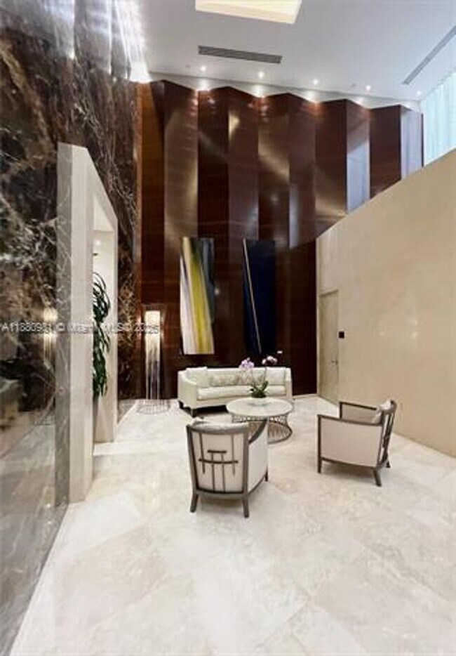 Building Photo - 15811 Collins Ave