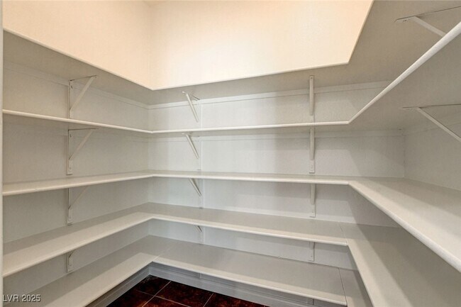 Building Photo - 9060 Candyland Ave