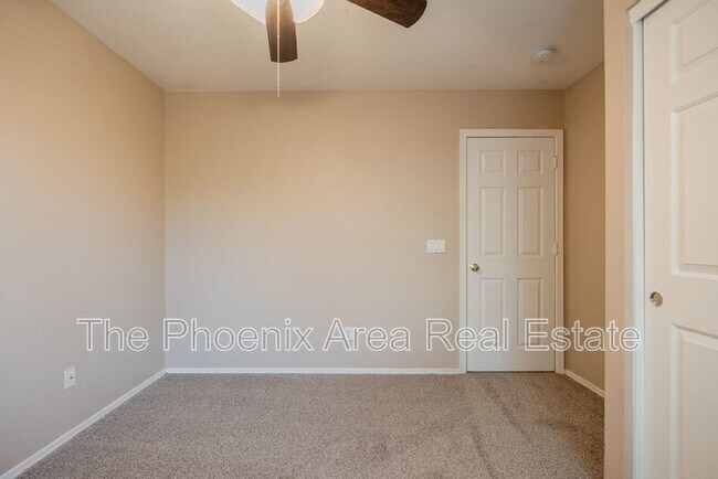 Building Photo - 3095 E Merrill Ave