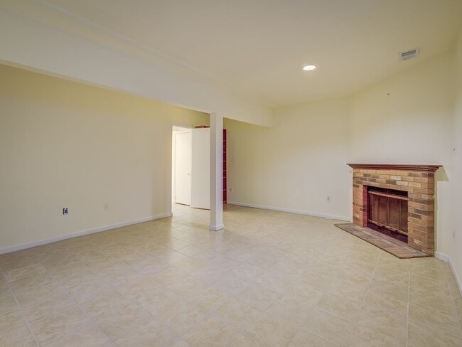 Building Photo - A Lovely Brick-Front Town House