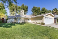 Building Photo - Beautiful Rental in Guard-Gated Hidden Lak...