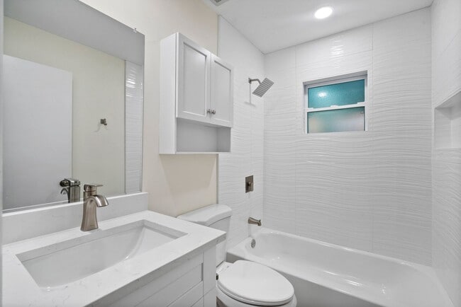 Building Photo - ANNUAL RENTAL - 2 Bedroom, 1 Bath w/ Garag...