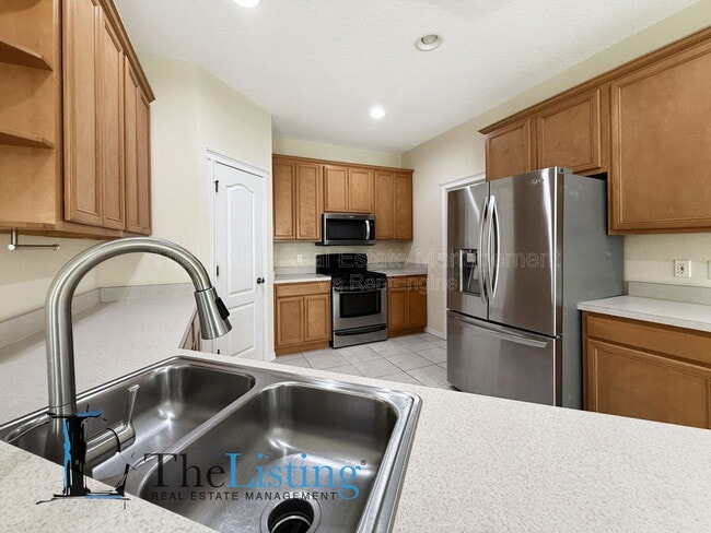 Building Photo - 7411 Surrey Wood Ln