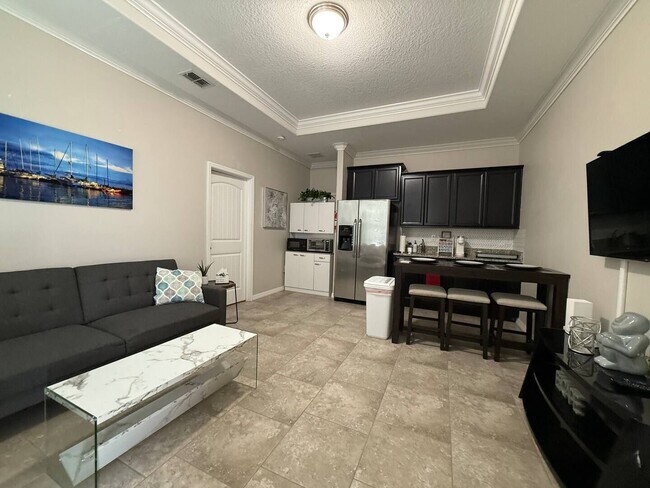 Building Photo - Furnished 1-Bedroom Apartment in Kindred –...