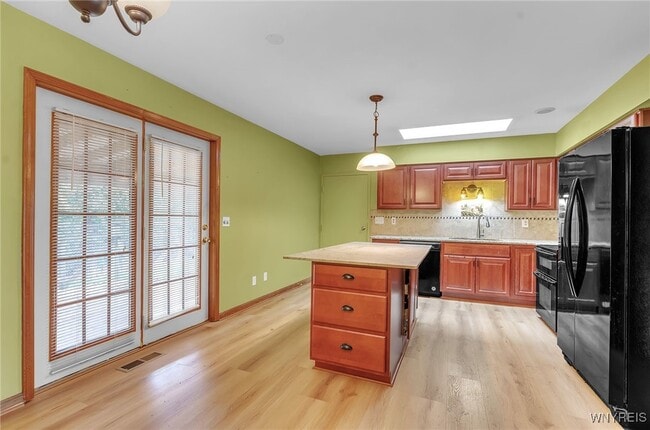 Building Photo - 9400 Wehrle Dr